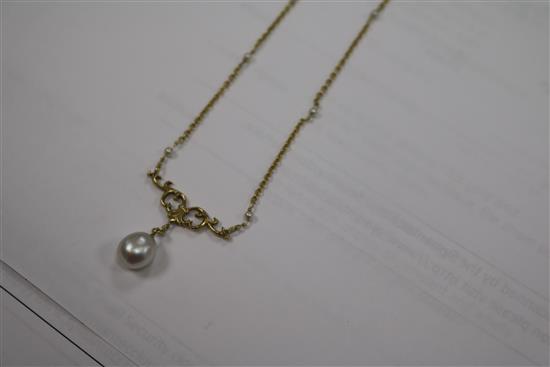 An 18ct gold and cultured? pearl drop necklace, the chain set with seed pearls, 62cm.